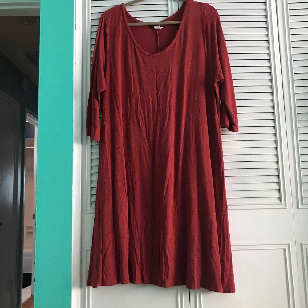 3/4 length sleeve dress with a flowy skirt